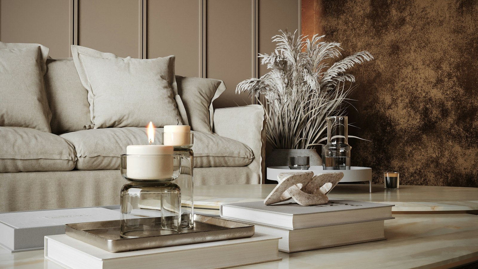 Trendfarben 2026 in einem Wohnzimmer mit warmen, neutralen Tönen, Sofa und Couchtisch